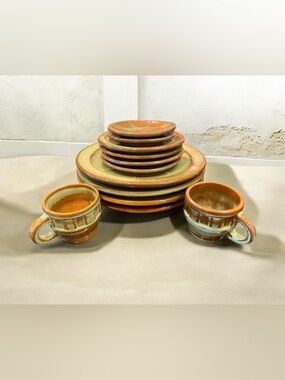 12 Piece vintage 1940 Frankoma Wagon
Wheel Dinner Ware.